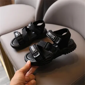 Laste sandaalid 2021 suvel uued poiste sandaalid pehme põhjaga blokeerumisvastased rand kingad tüdrukute mood värviga sandaalid on Takjakinnitusega
